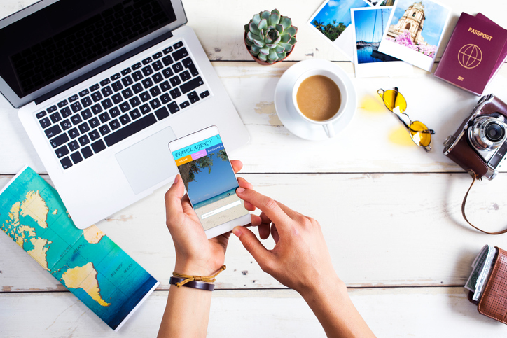 Travel booking website in mobile phone screen